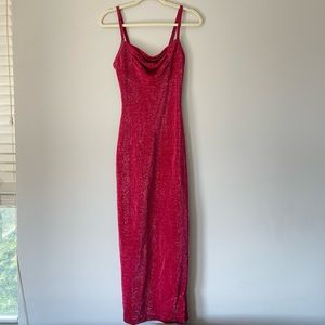 Form fitting sparkly fuchsia dress with slit in back. Size small.